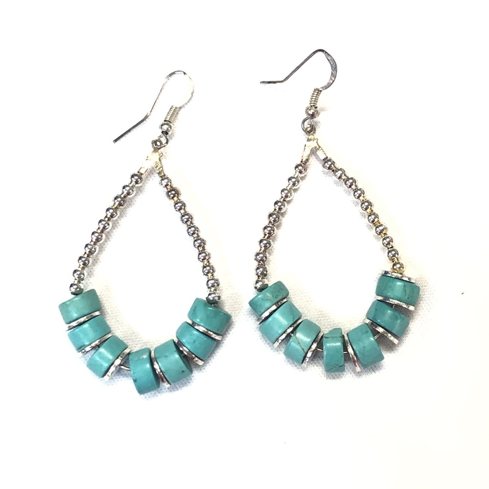 Silver toned beads and turquoise teardrop shaped earrings